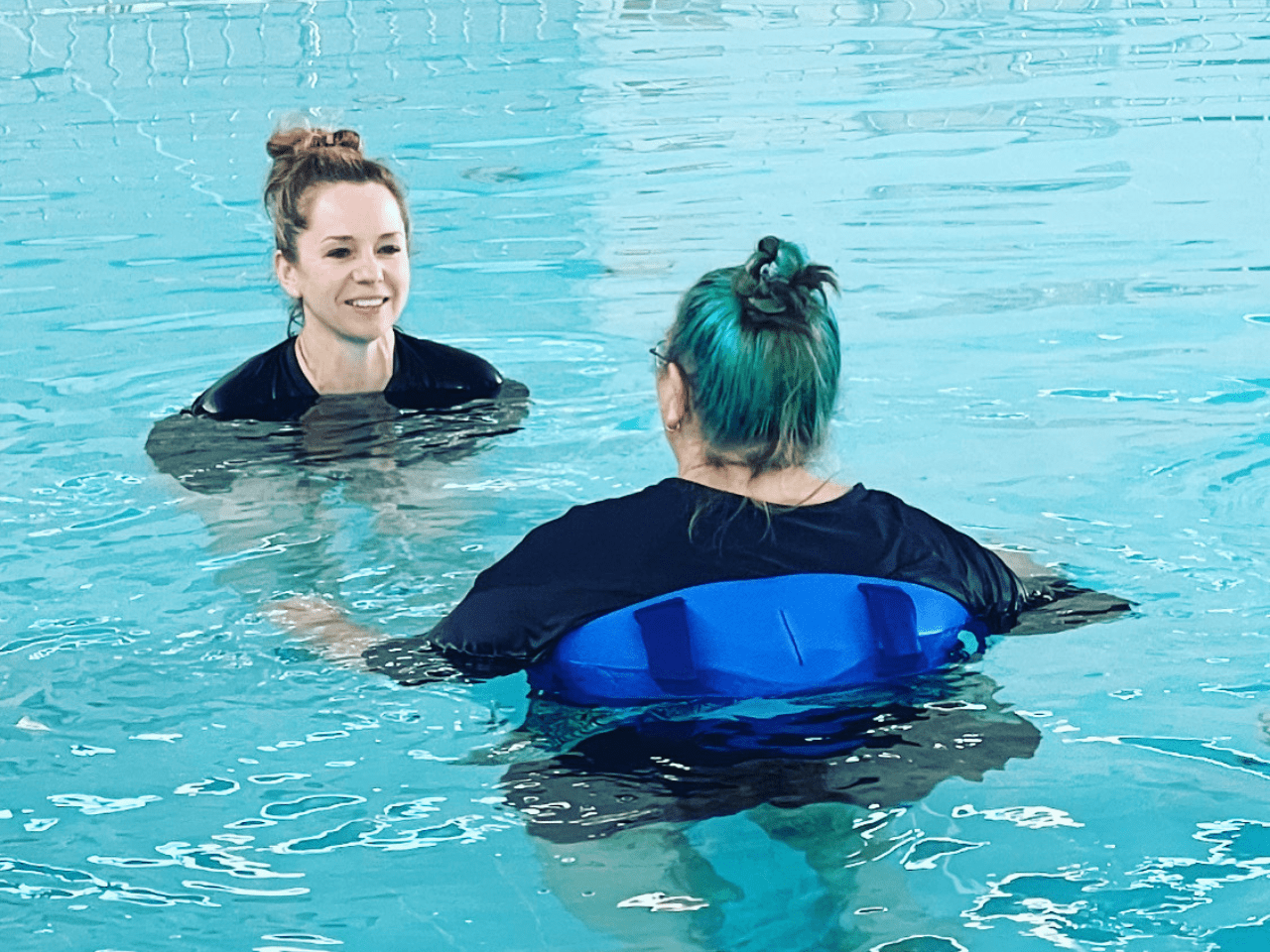Hydrotherapy. In the pool is our Physiotherapist Faith with a client