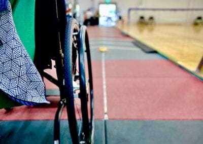 A wheelchair set up to be pushed down the track at the Sporting Wheelies gym.