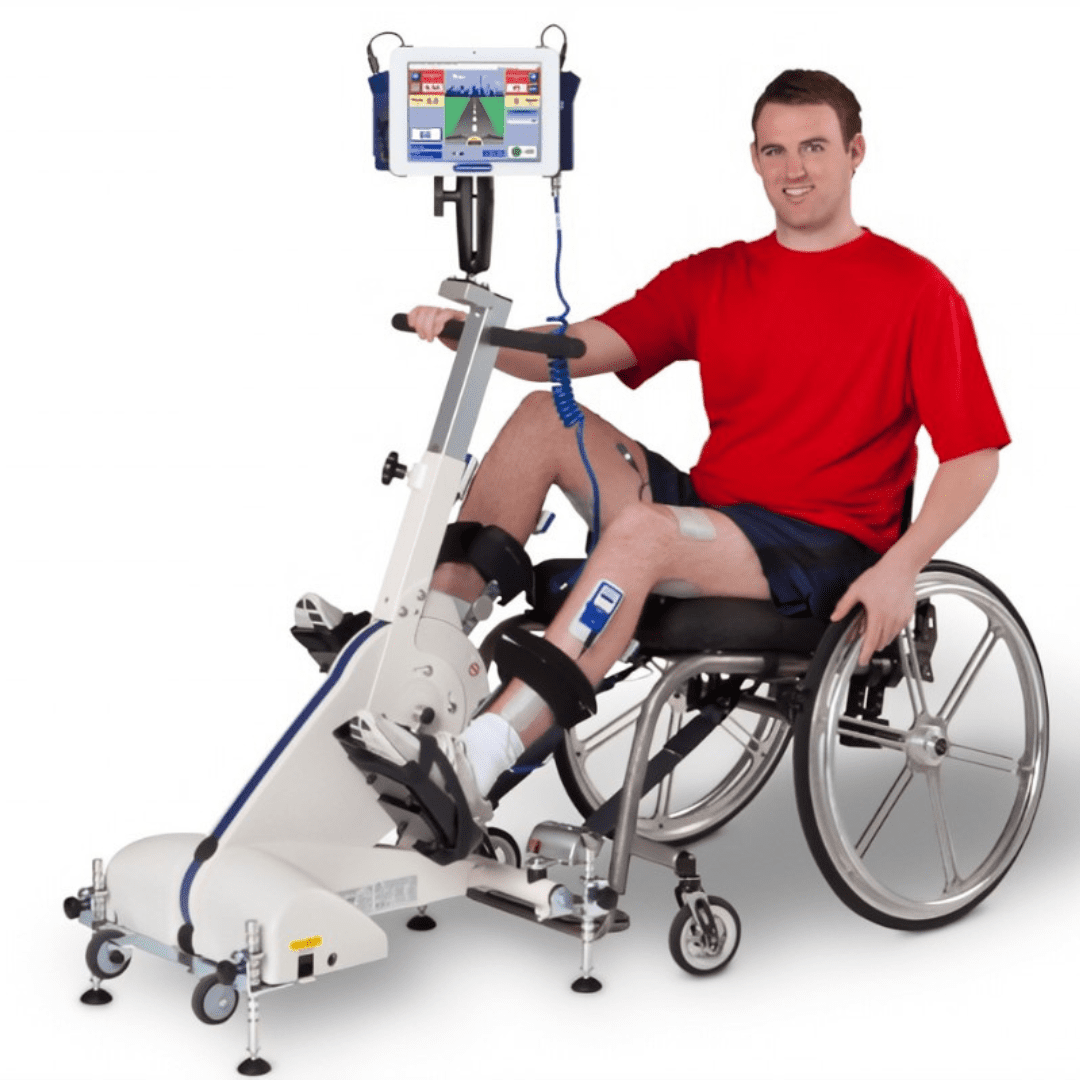 Man sitting on a Functional Electrical Stimulation Cycle to provide high intensity muscle contractions to activate nerves.