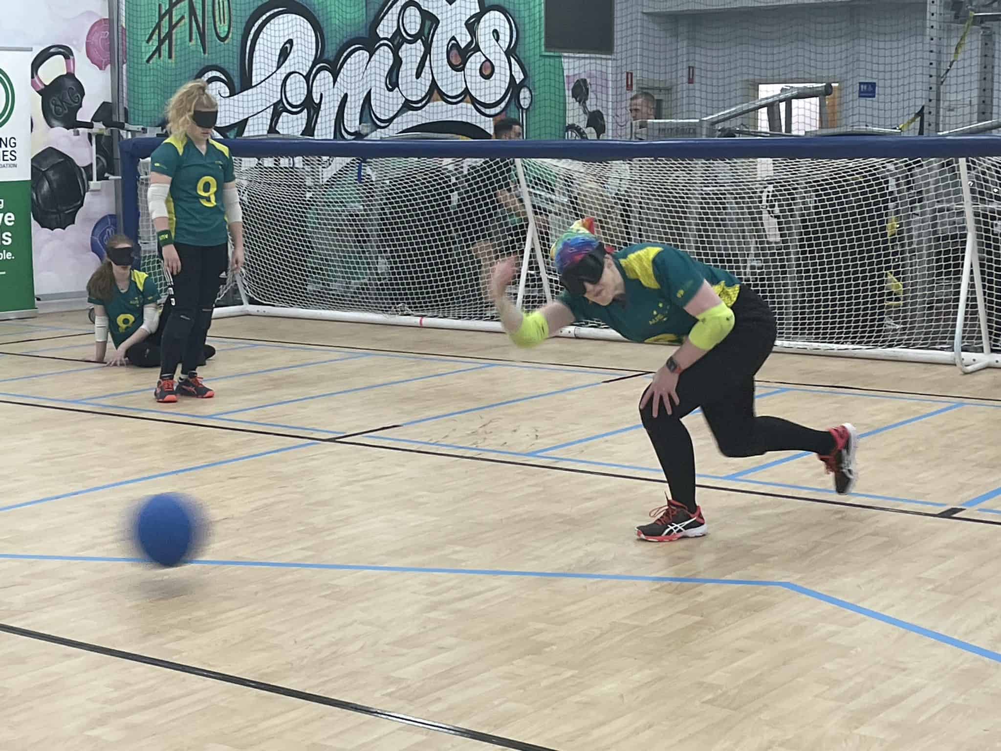 Australian Paralympians train for goalball at the Sporting Wheelies Brisbane gym.