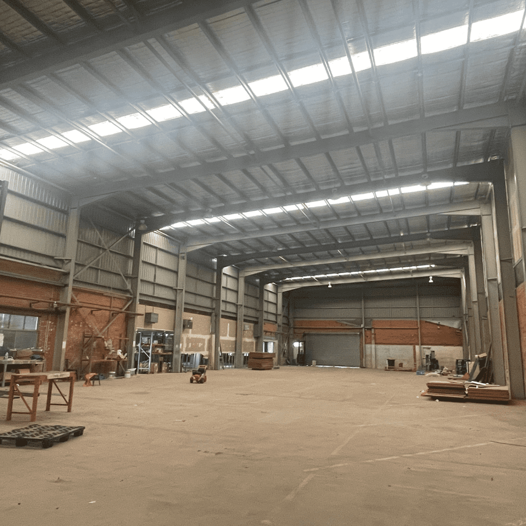 Inside photo of the Milton site showing an empty warehouse that will be transformed into sports courts