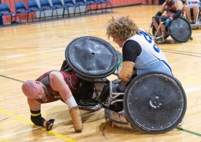 Two players collide in a game of wheelchair rugby.