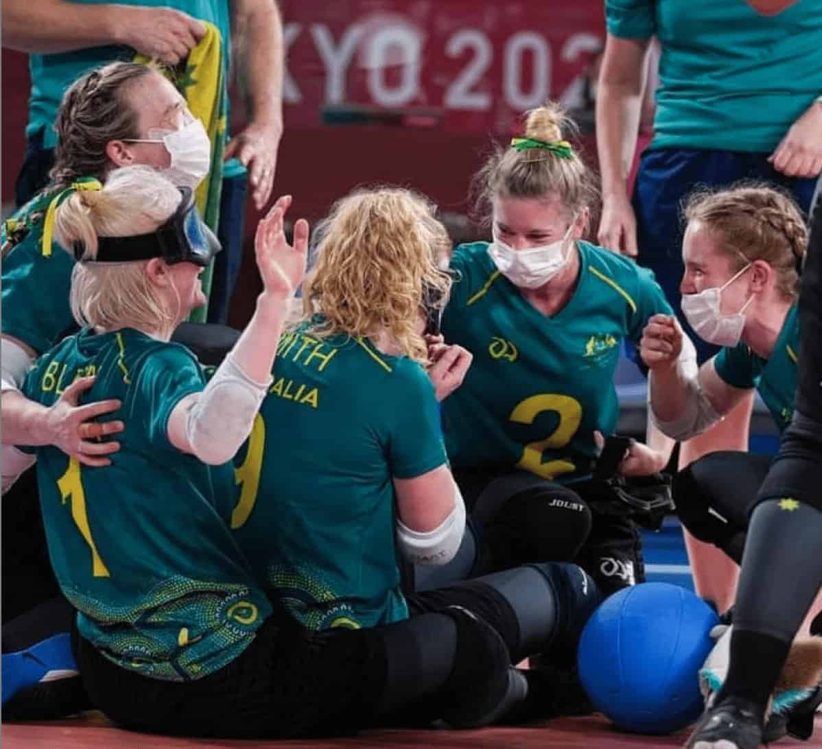 Australian women goalball team celebrating a win at the Paralympics.