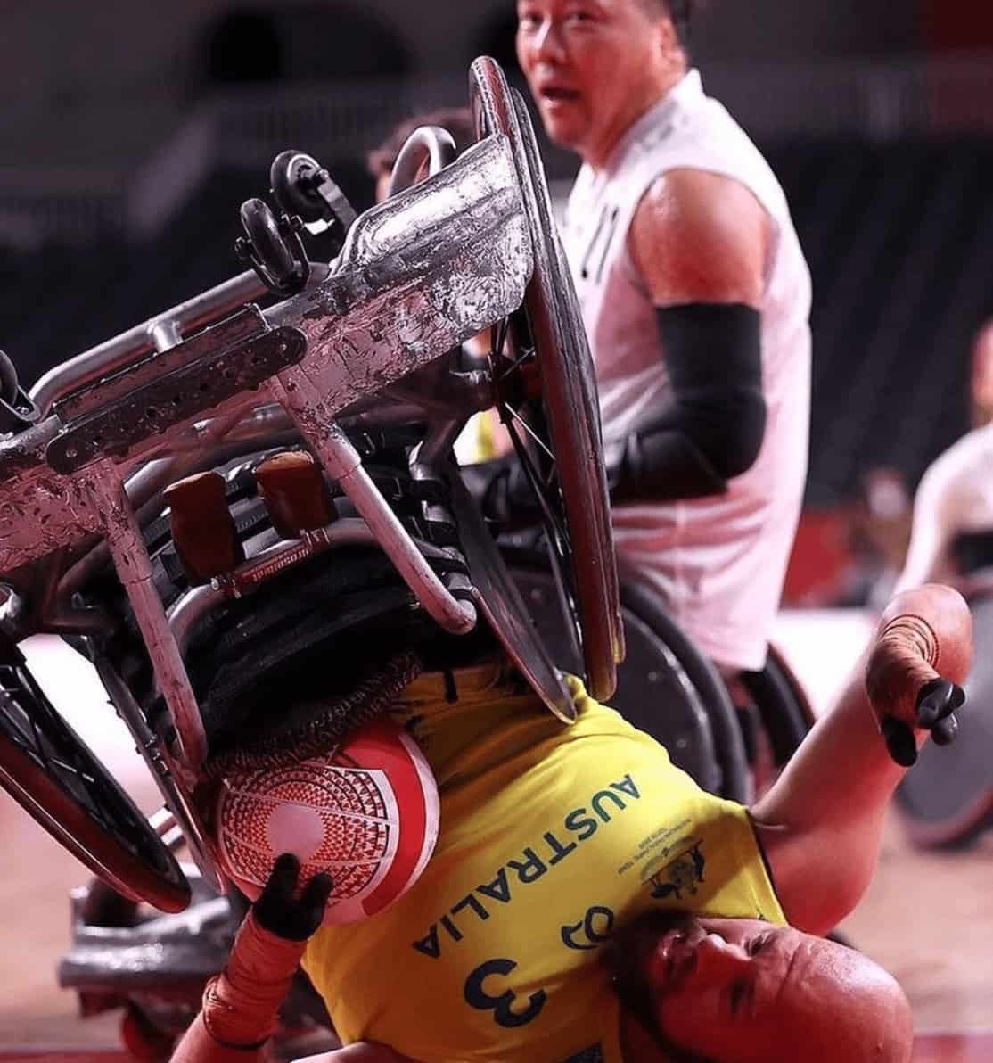 Australian Paralympian fallen over after a collision in a game of wheelchair rugby.
