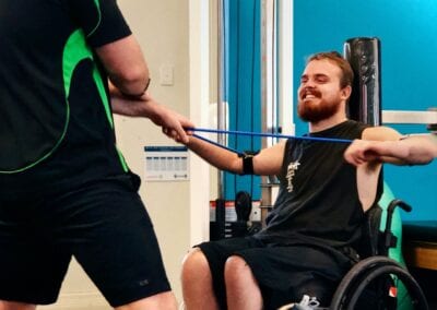 Male client completes a fitness session with the support of his exercise physiologist.